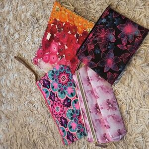Four Floral Cosmetic Bags from Estee Lauder, ela x Burt's Bees, Others